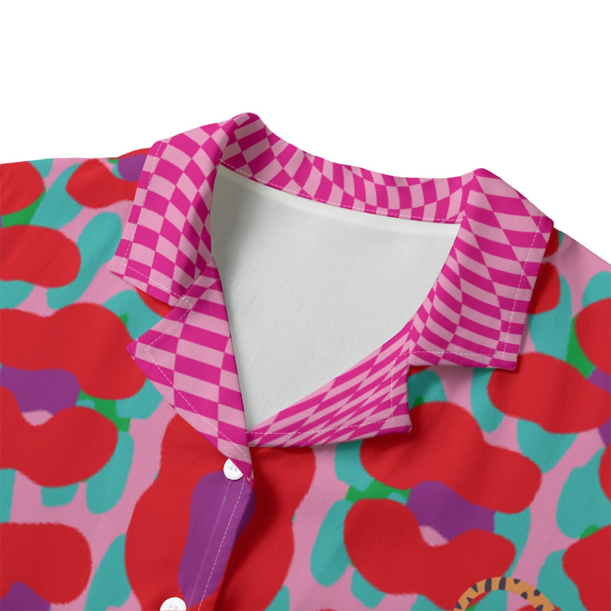 Colorful patterned fabric with a checkered border on a white background