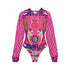 Colorful onesie with animal patterns on a white background