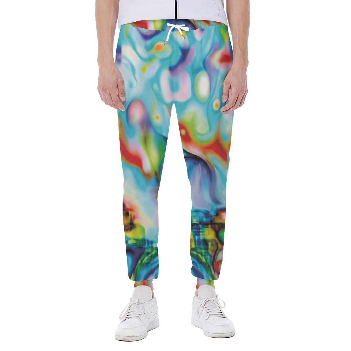 Colorful abstract patterned pants worn by a person on a white background
