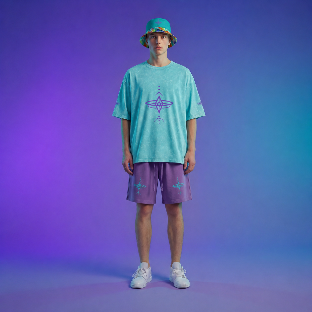 Person wearing a teal t-shirt and purple shorts with a geometric design on a gradient purple background