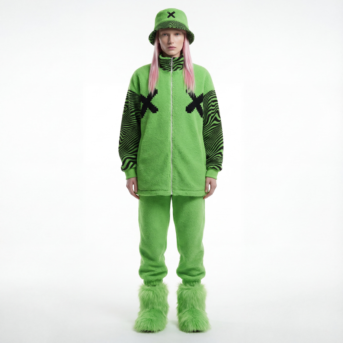 Person wearing a green outfit with black designs on a white background
