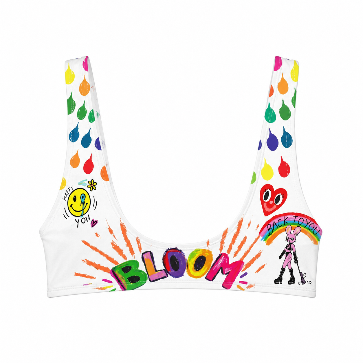 A white sports bra featuring colorful graphic prints, including the word 'BLOOM' in rainbow letters, a smiley face with 'I love you' text, a cartoon bunny under a rainbow, and colorful teardrop shapes along the straps.