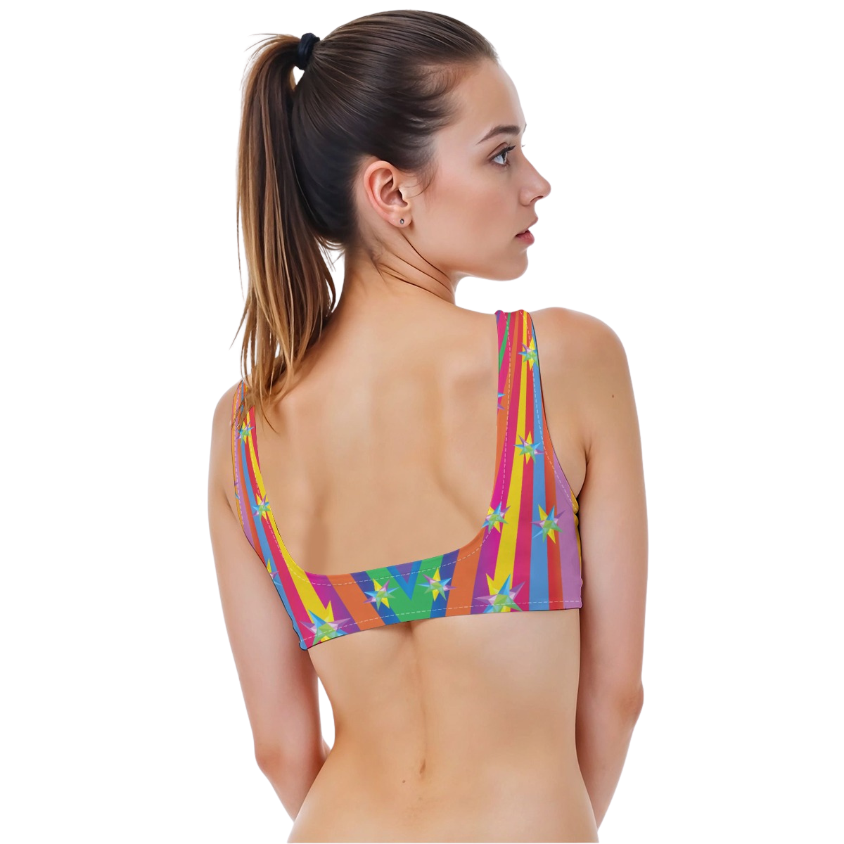 Woman wearing a colorful star-patterned bikini top on a white background