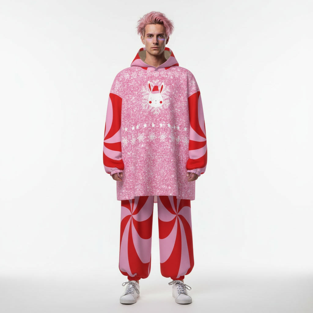 Person wearing a pink and red patterned outfit with a white background