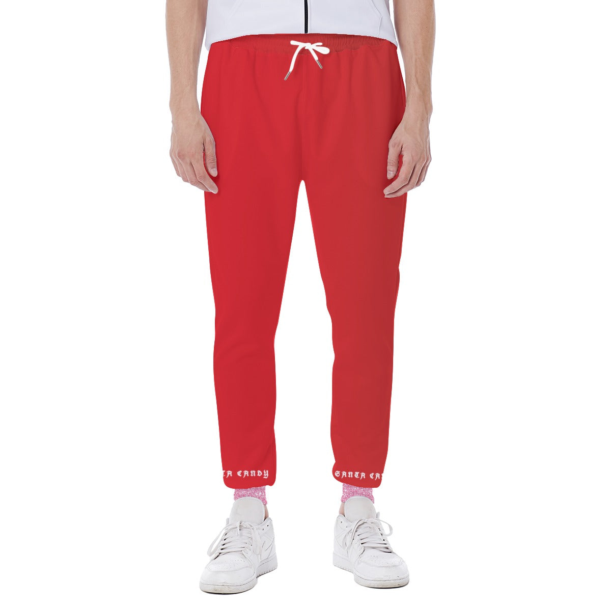 Red sweatpants worn by a person on a white background