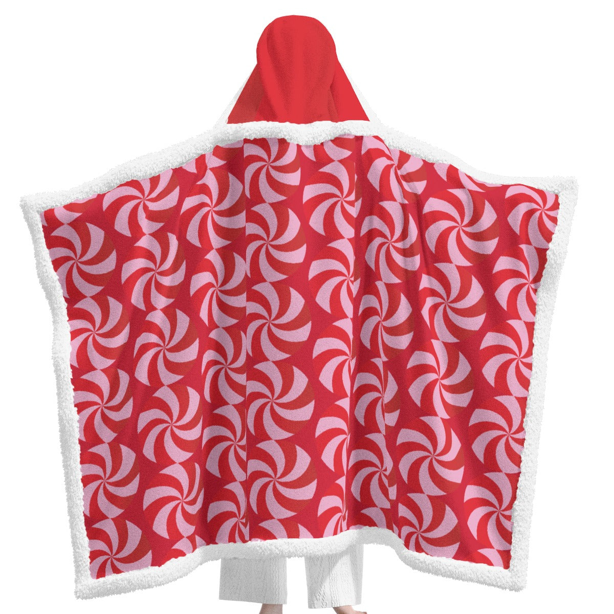 Red and white peppermint patterned hooded blanket on a white background