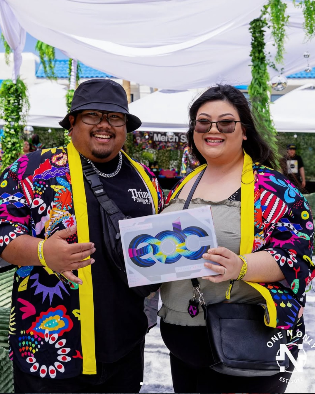 Festival community wearing custom merchandise created by Frammy Design Studio