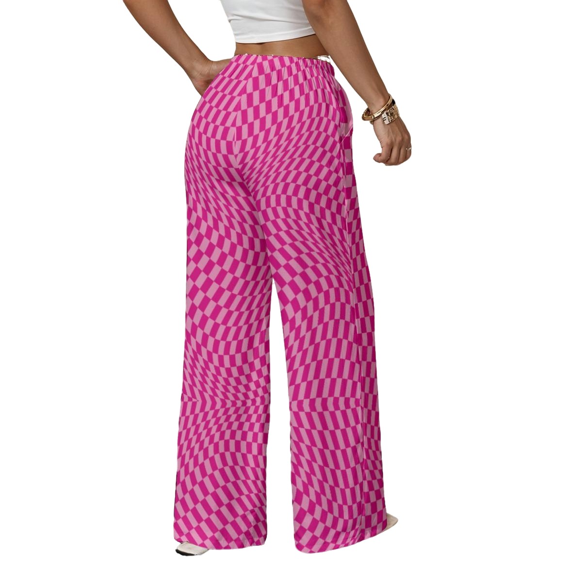 Person wearing pink checkered pants on a white background
